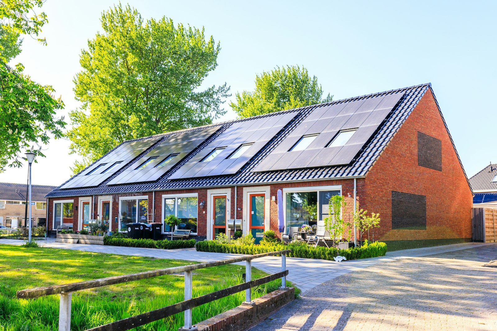 Homes with solar panels covering their roofs