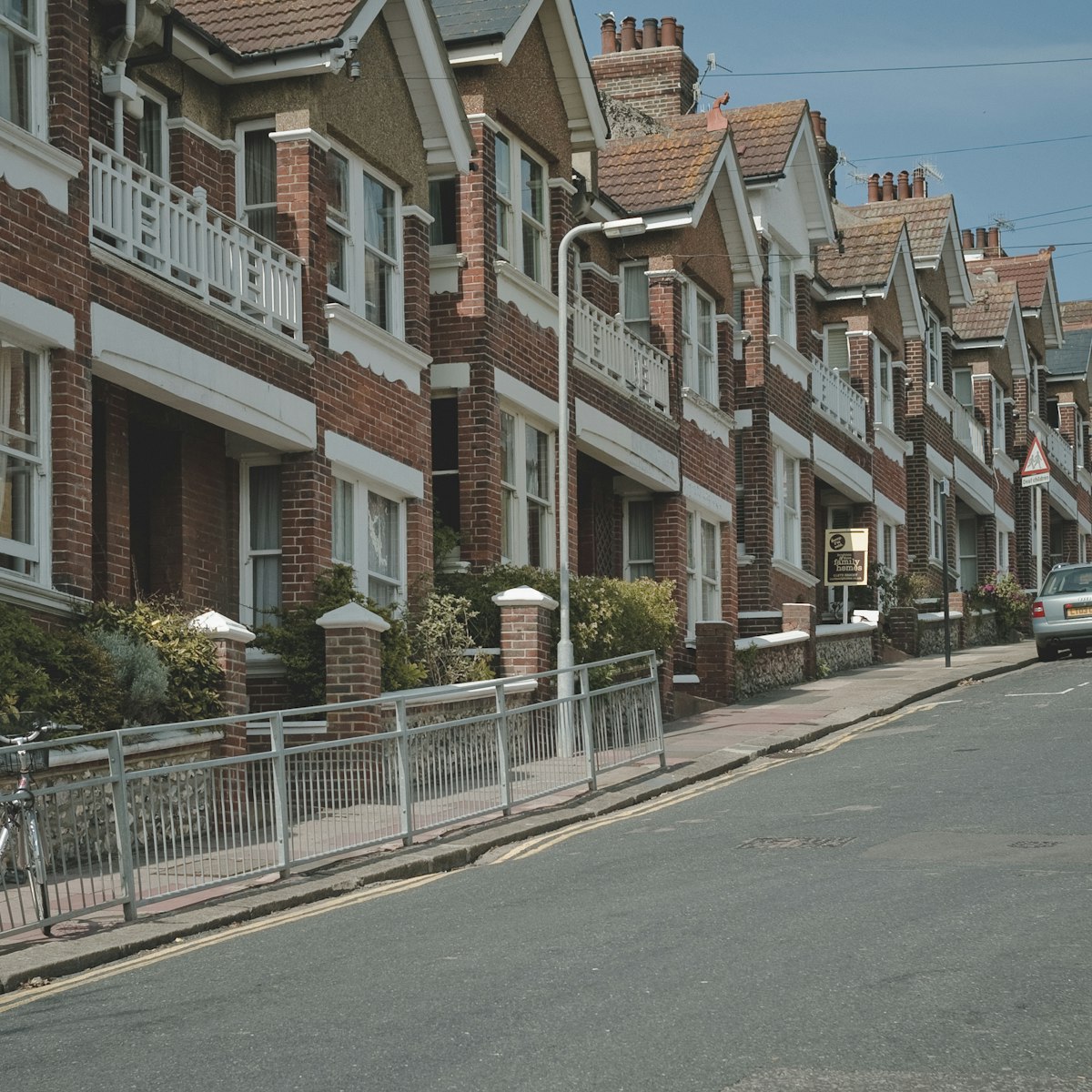 A street of traditional British bay-fronted houses