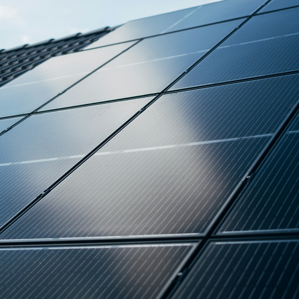 Close-up of sleek all-black solar panels